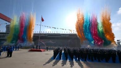 China launches biggest amphibious assault ship in projection of military power