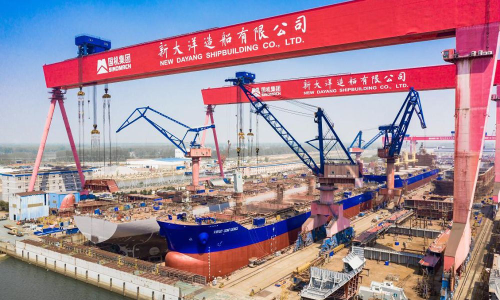 Shanghai Minsheng books feeder duo at New Dayang