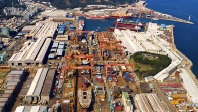 HD Hyundai union boss scales crane as wage talks collapse