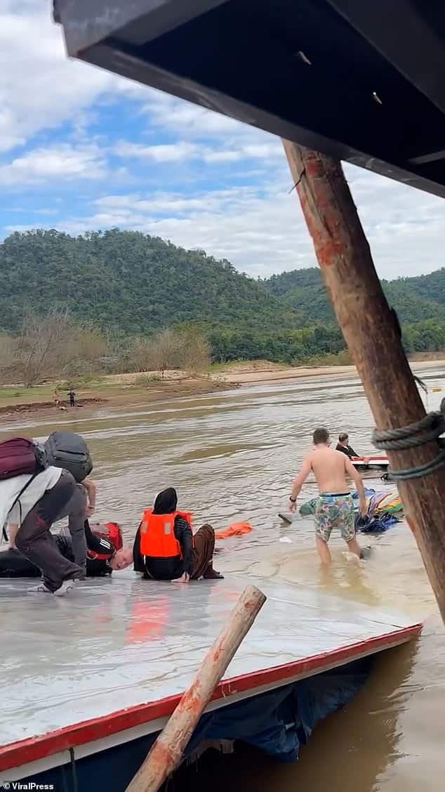 British tourists among more than 100 rescued as ferry capsizes in Laos