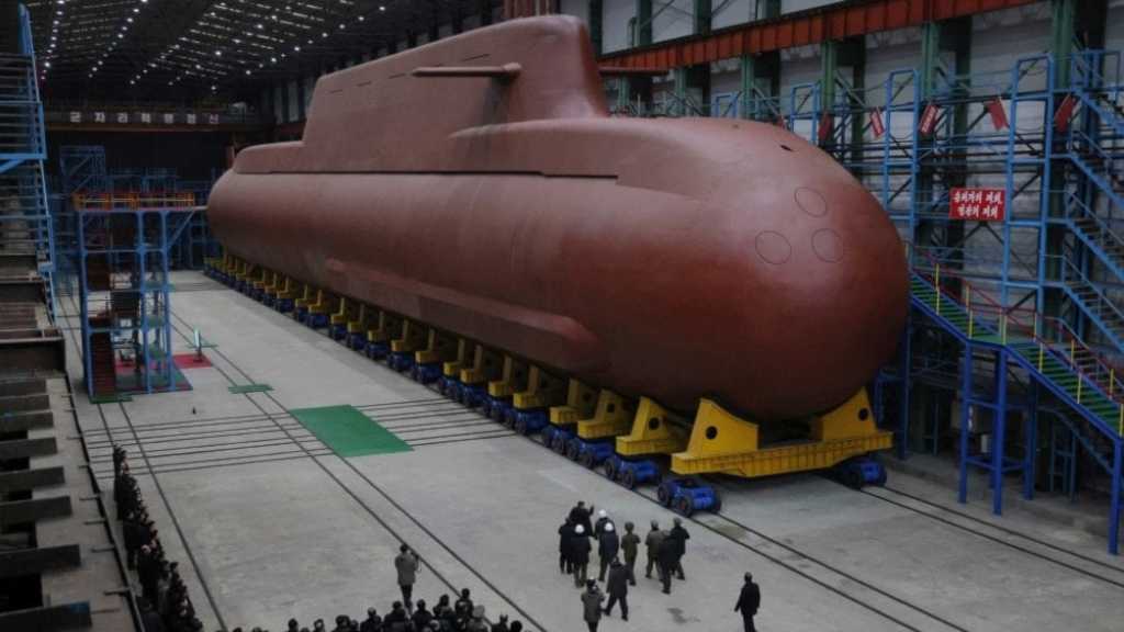 Koreas:Kim Reviews Construction of Nuclear Submarine