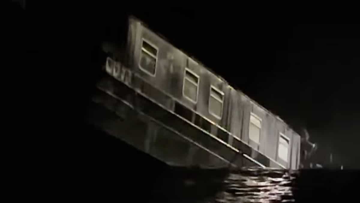 Moment enormous 50-metre sinkhole swallows up canal boat as major incident