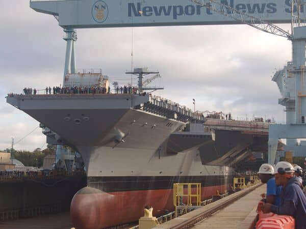 Aircraft carrier John F Kennedy leaves shipyard for sea trials