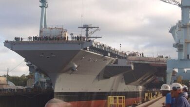Aircraft carrier John F Kennedy leaves shipyard for sea trials