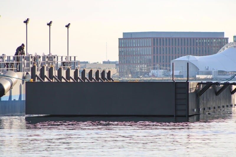 Boston Harbor Shipyard launches two MBTA dock barges