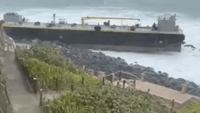 Fuel barge runs aground after losing propulsion in rough seas
